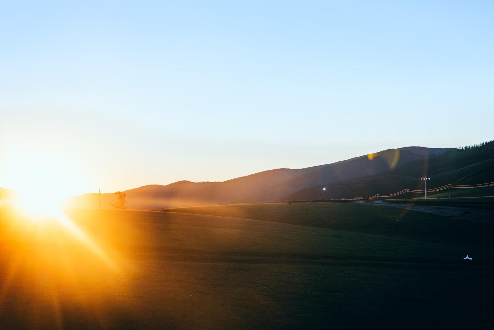 Sunlight on the Grassy Hills